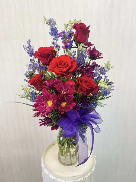 Rhapsody in Purple from Rogers Florist, your flower shop in Meridian, MS