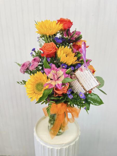 Cheerful Blooms from Rogers Florist, your flower shop in Meridian, MS