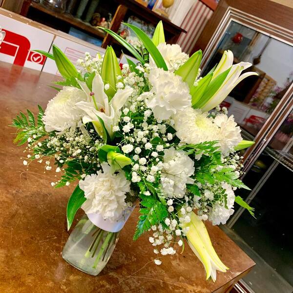 All White from Rogers Florist, your flower shop in Meridian, MS