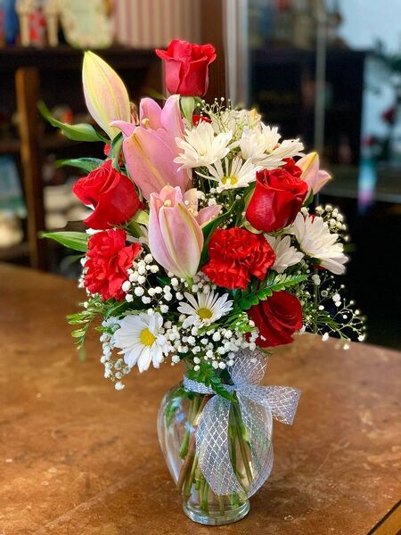 Pure Romance from Rogers Florist, your flower shop in Meridian, MS