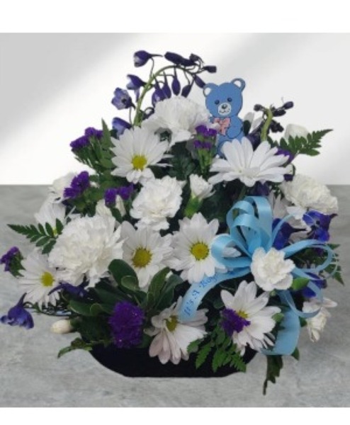 B.Boy Basket from Rogers Florist, your flower shop in Meridian, MS